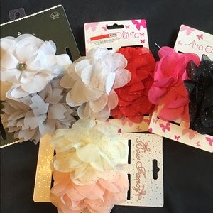 Lot of 4 sets of hair accessories.